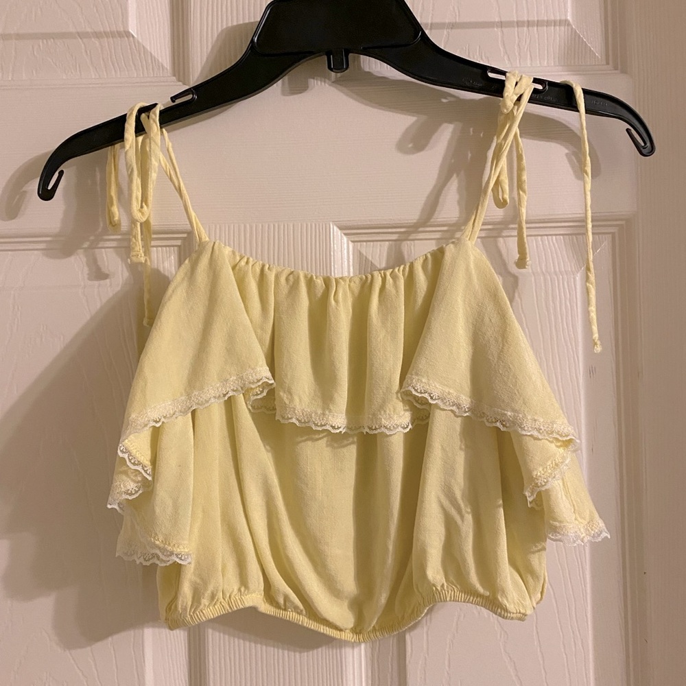 Cute yellow strappy crop top. Size S
